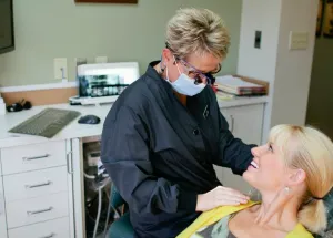 woman in chair for dental treatment